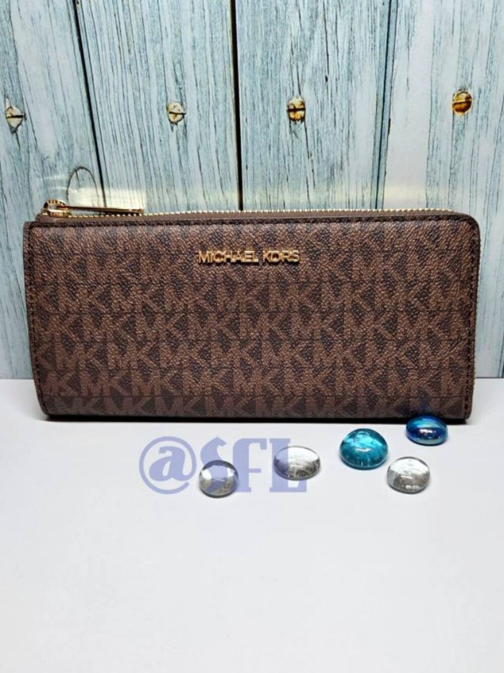 Michael Kors Jet Set Travel L Zip Wallet In Monogram Luggage Brown